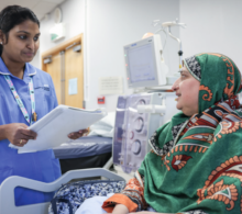 Nurse talking to patient