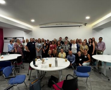 A photo depicting a group photo of all attendees